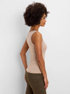 Fitted light beige ribbed knit scoop tank.