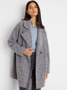 Mixed grey boucle knit jacket with lapel collar, relaxed fit, and single dark button.