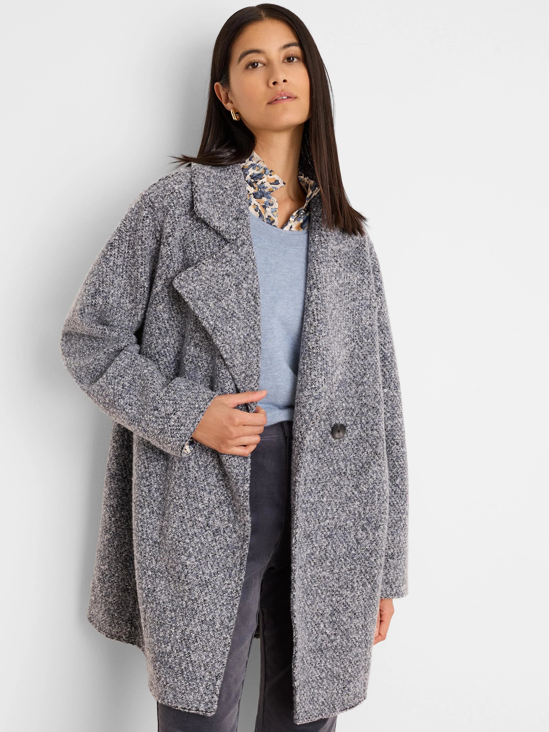 Mixed grey boucle knit jacket with lapel collar, relaxed fit, and single dark button.