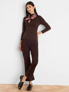Dark brown shimmering long-sleeve high-neck top.