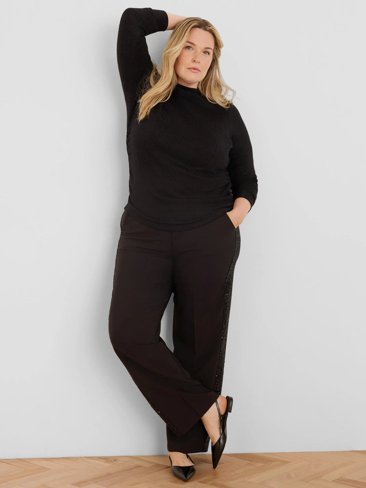 Black sparkly mock neck top with ruched sides.