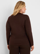Dark brown, long-sleeved mock neck top with subtle shimmer.
