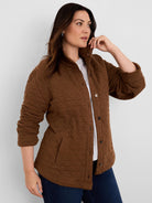 Brown quilted knit jacket with diamond pattern, stand collar, snap buttons, and front patch pockets.