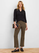 Black ribbed knit long-sleeve polo with collar and button placket.