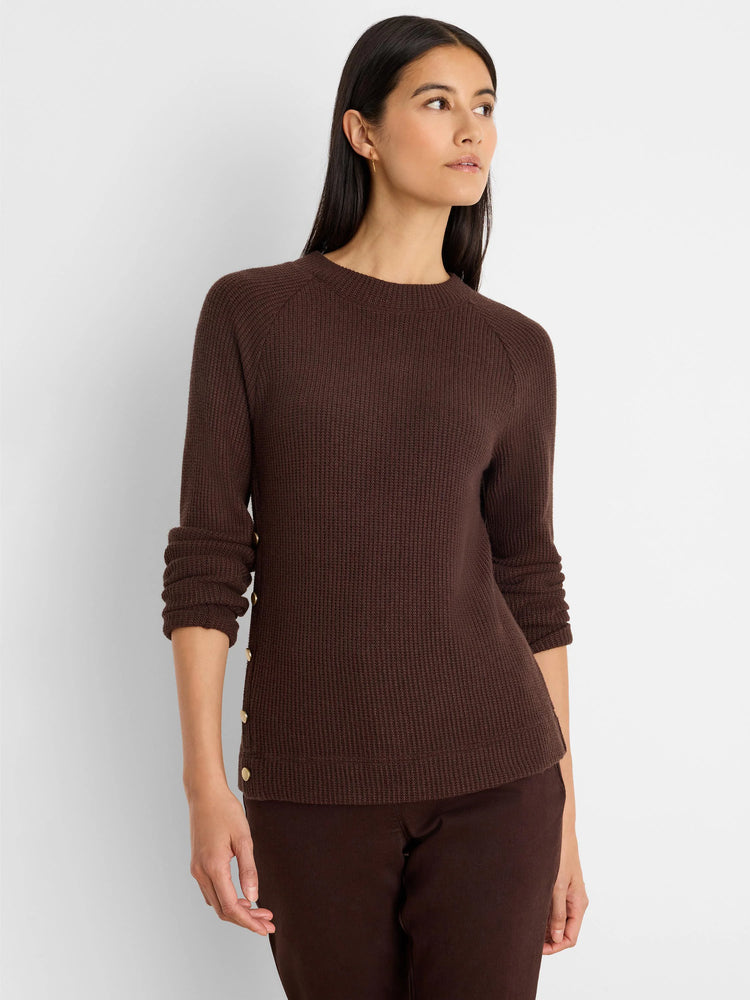 Dark brown waffle knit top with a crew neck, raglan sleeves, and gold buttons lining the left side.