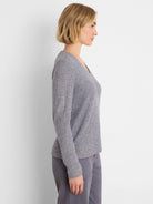 Heather grey waffle knit thermal top with a V-neck and long sleeves, worn by a model.