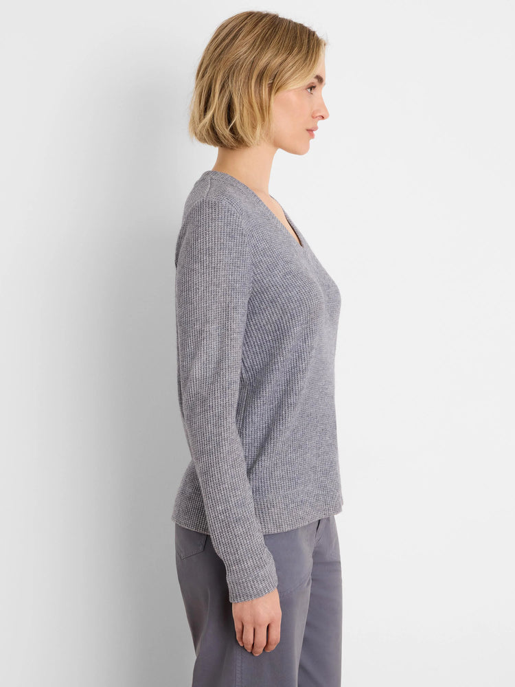 Heather grey waffle knit thermal top with a V-neck and long sleeves, worn by a model.