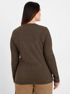 Dark olive green crinkle knit long-sleeve top on model, back view.