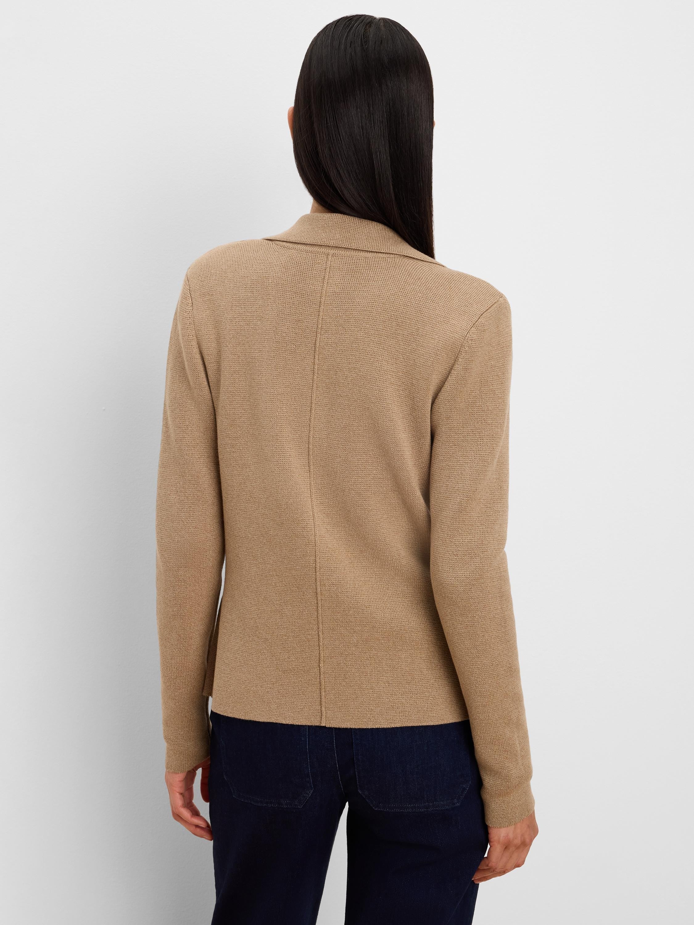 Camel knit tailored blazer, back view. Features visible knit texture and a central back seam.