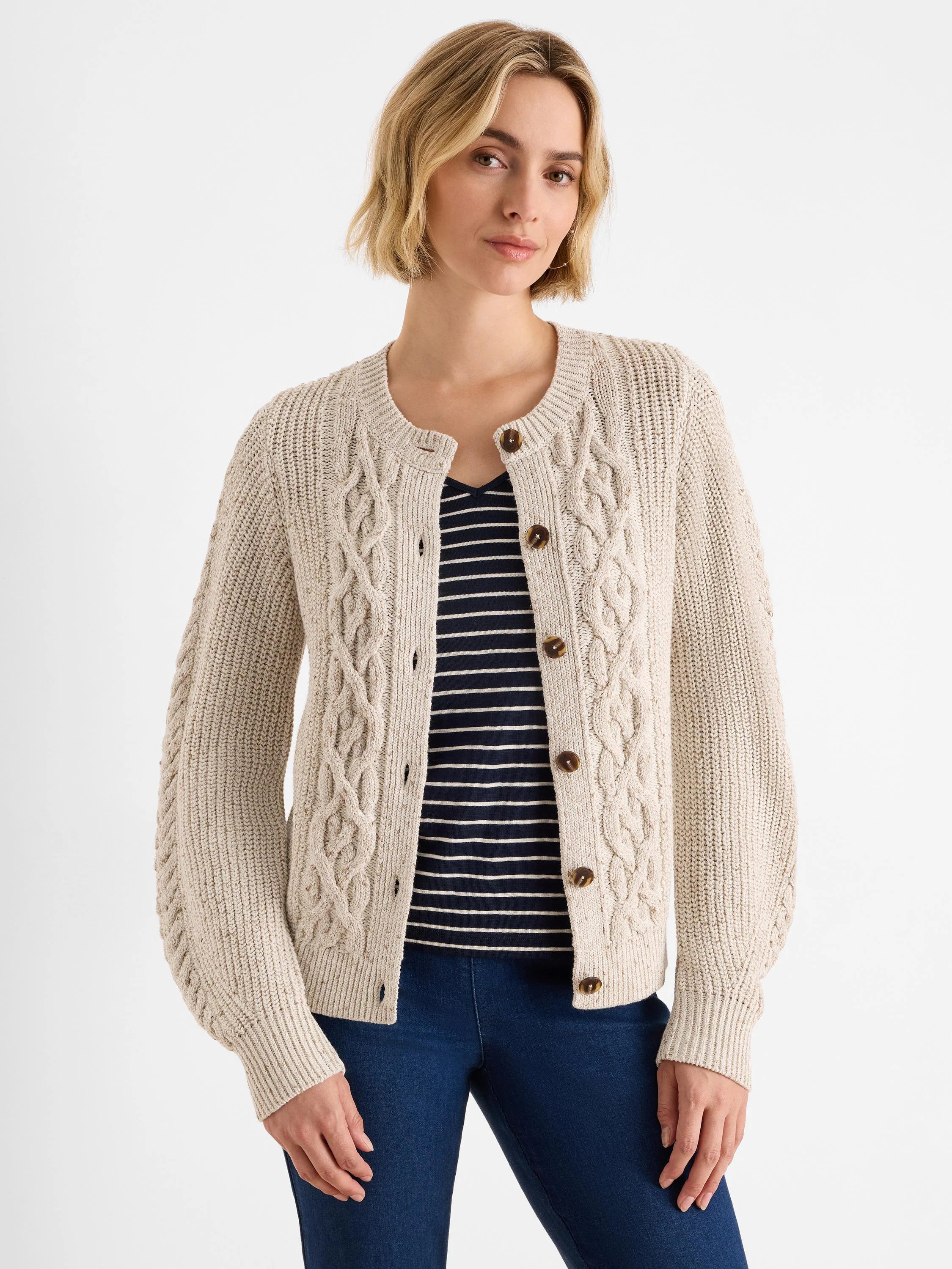 Oatmeal flecked cable knit cardigan with a round neck and brown buttons.