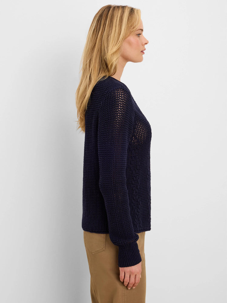 Navy blue mixed-stitch sweater. Features open knit upper, and diamond stitch on lower body and sleeves.