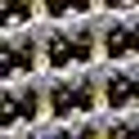 Dark, flecked fabric. Mix of charcoal, muted blue-purple, and light tan.