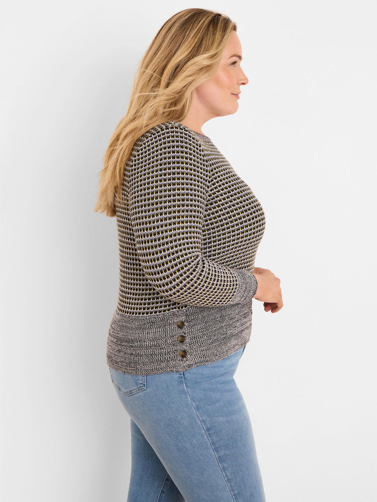 Marled grey & black knit sweater with small yellow-gold patterned upper. Features a darker hem with three side buttons.