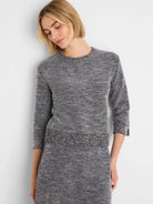 Black & white speckled tweed stitch sweater, round neck, 3/4 sleeves.