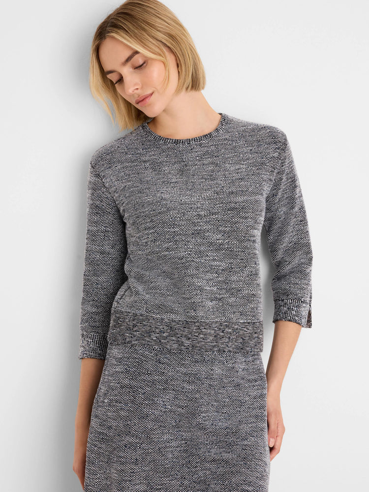 Black & white speckled tweed stitch sweater, round neck, 3/4 sleeves.