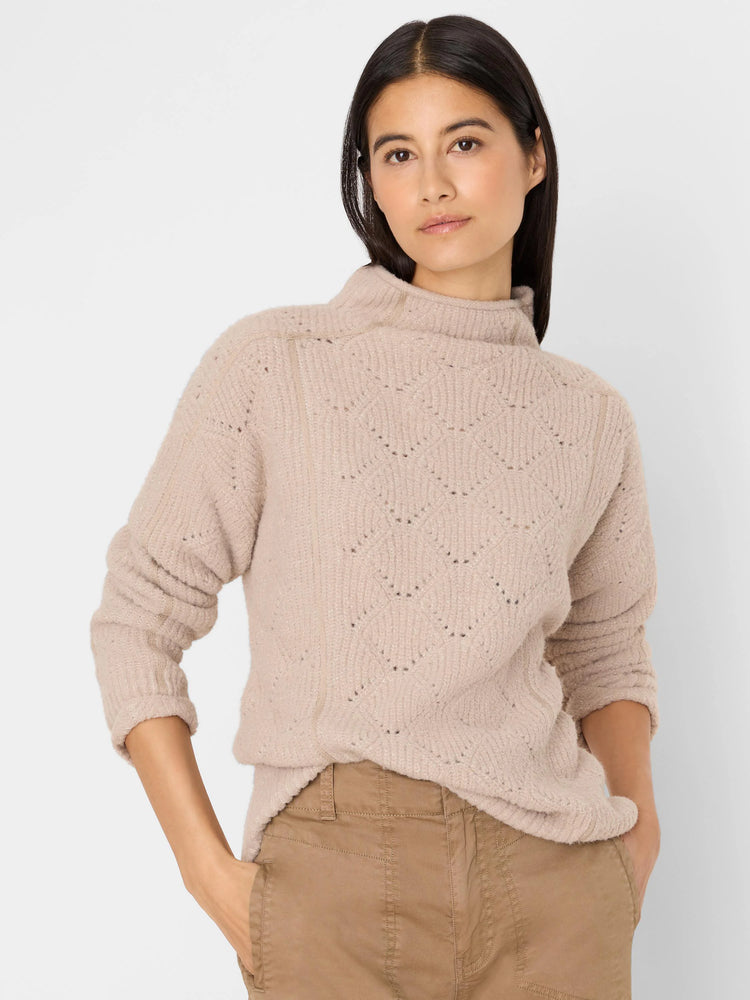 Pale beige fuzzy mock neck sweater with open-work diamond knit pattern.