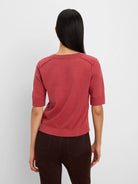 Rear view: Terracotta short-sleeve sweater tee with ribbed cuffs, hem, and a crew neck.