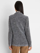 Black and white tweed stitch sweater jacket, back view. Fine weave with subtle blue flecks.
