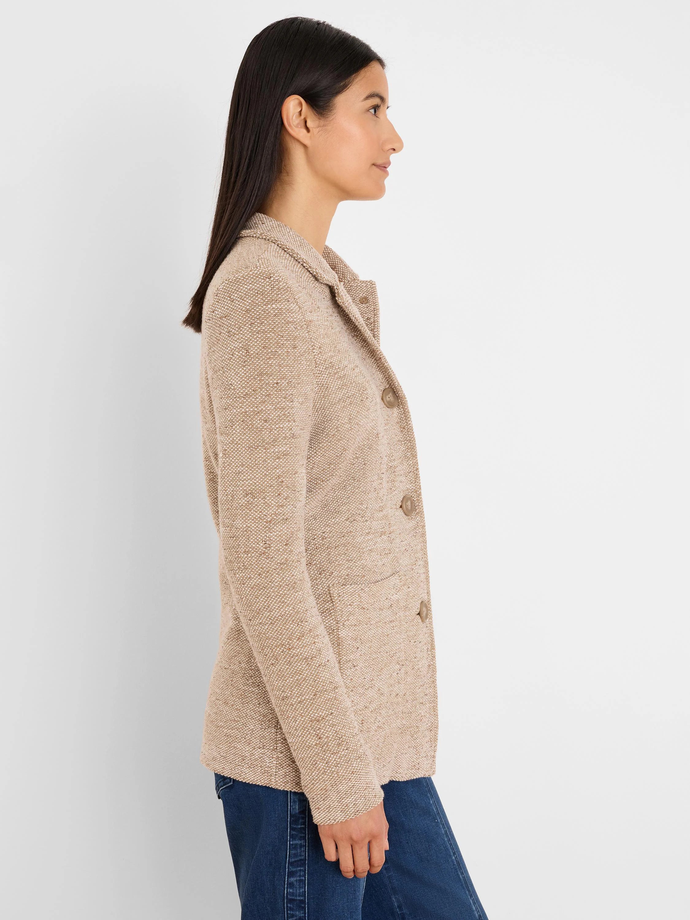 Beige tweed knit jacket featuring a blazer collar, three brown buttons, and front patch pockets.