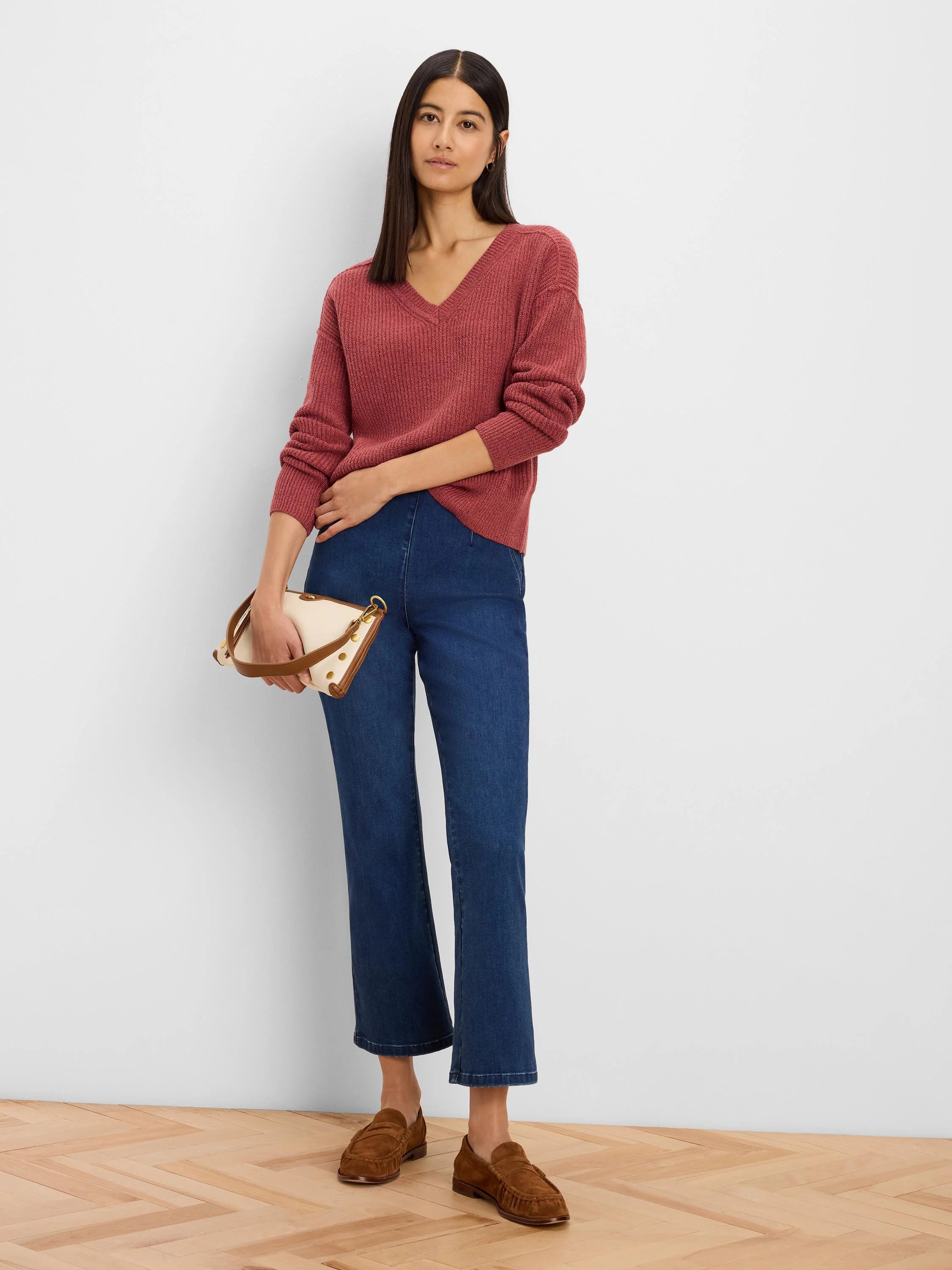 Dusty rose ribbed V-neck sweater. Relaxed fit, long sleeves.