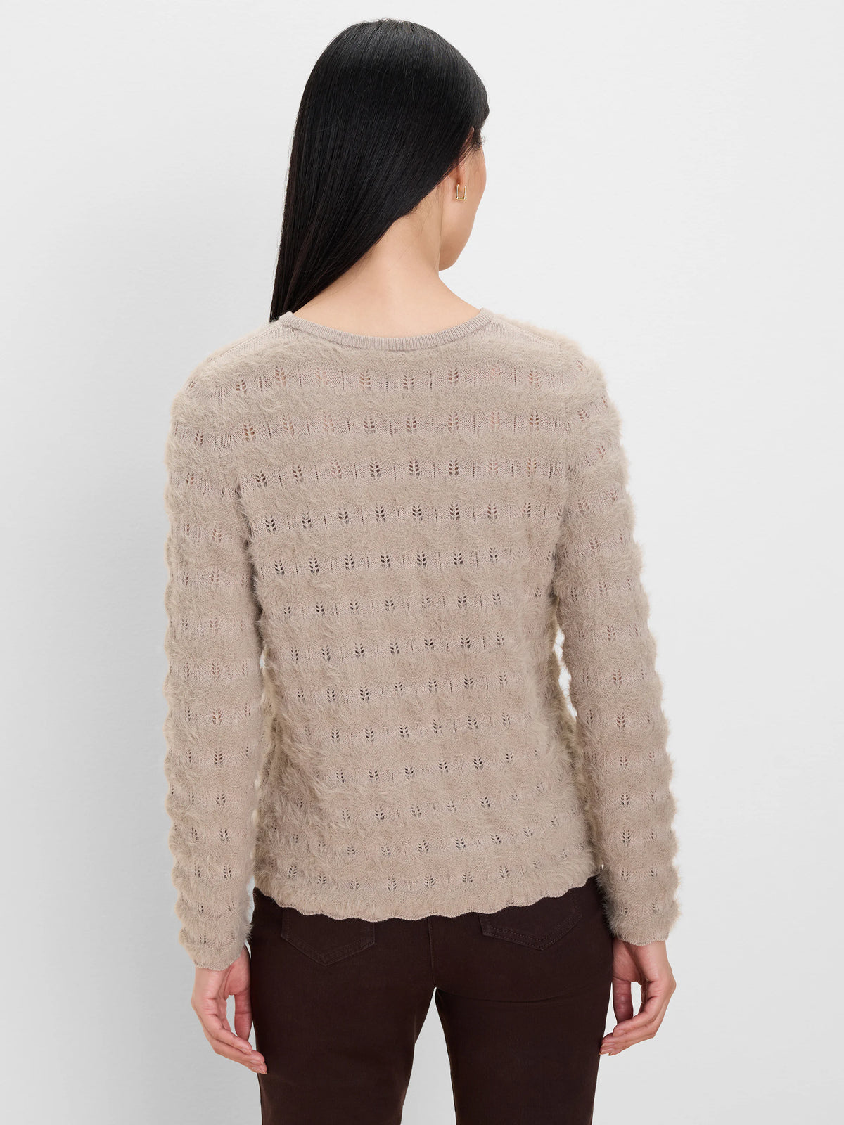 Light tan fuzzy sweater with openwork leaf pattern in rows and a scalloped hem.