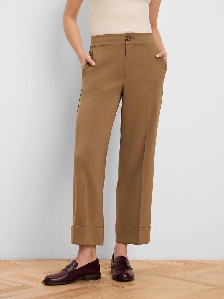Camel brown ankle pants with wide cuffed hems, a front button closure, and side pockets.