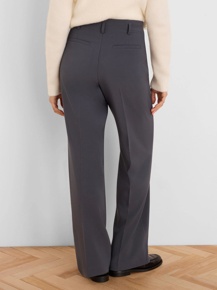 Dark gray wide-leg trousers, back view. Shows belt loops and two horizontal back pockets.