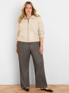 Wide-leg trousers in dark charcoal tweed with subtle metallic flecks.