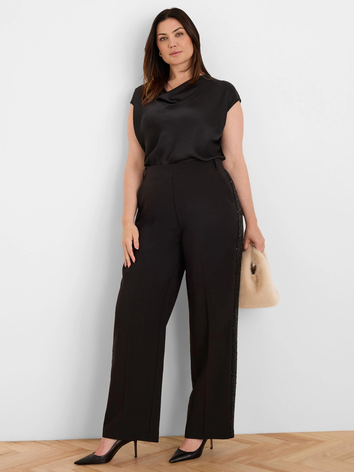 Black full-length pants with a straight leg and a black sequin stripe along each outer side seam.