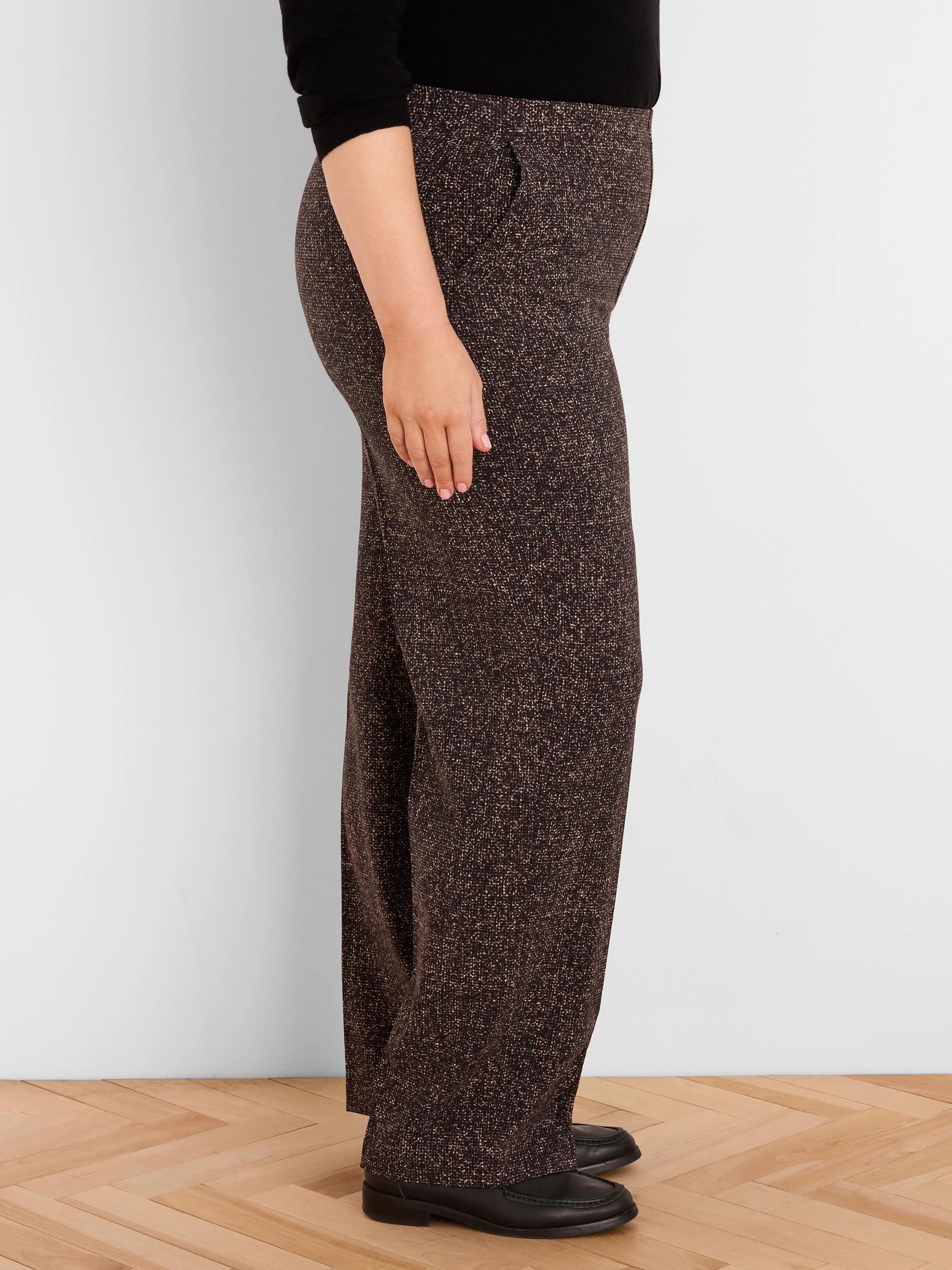 Dark brown wide leg pants with a speckled tan print, appearing tweed-like. Features an inset side pocket.