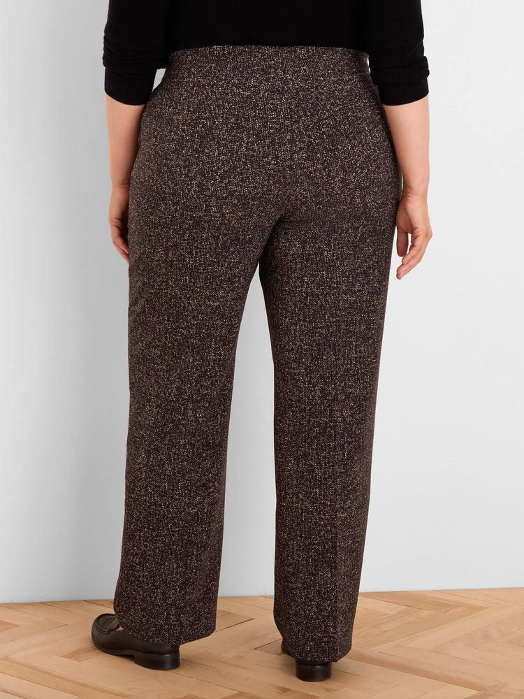 Back view of dark brown, full-length, wide-leg pants with a tan speckled print.