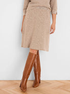Oatmeal tweed stitch knit skirt, knee-length with a ribbed hem.