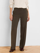 Dark olive wide leg pants, full-length with a smooth fabric and a subtle front crease.