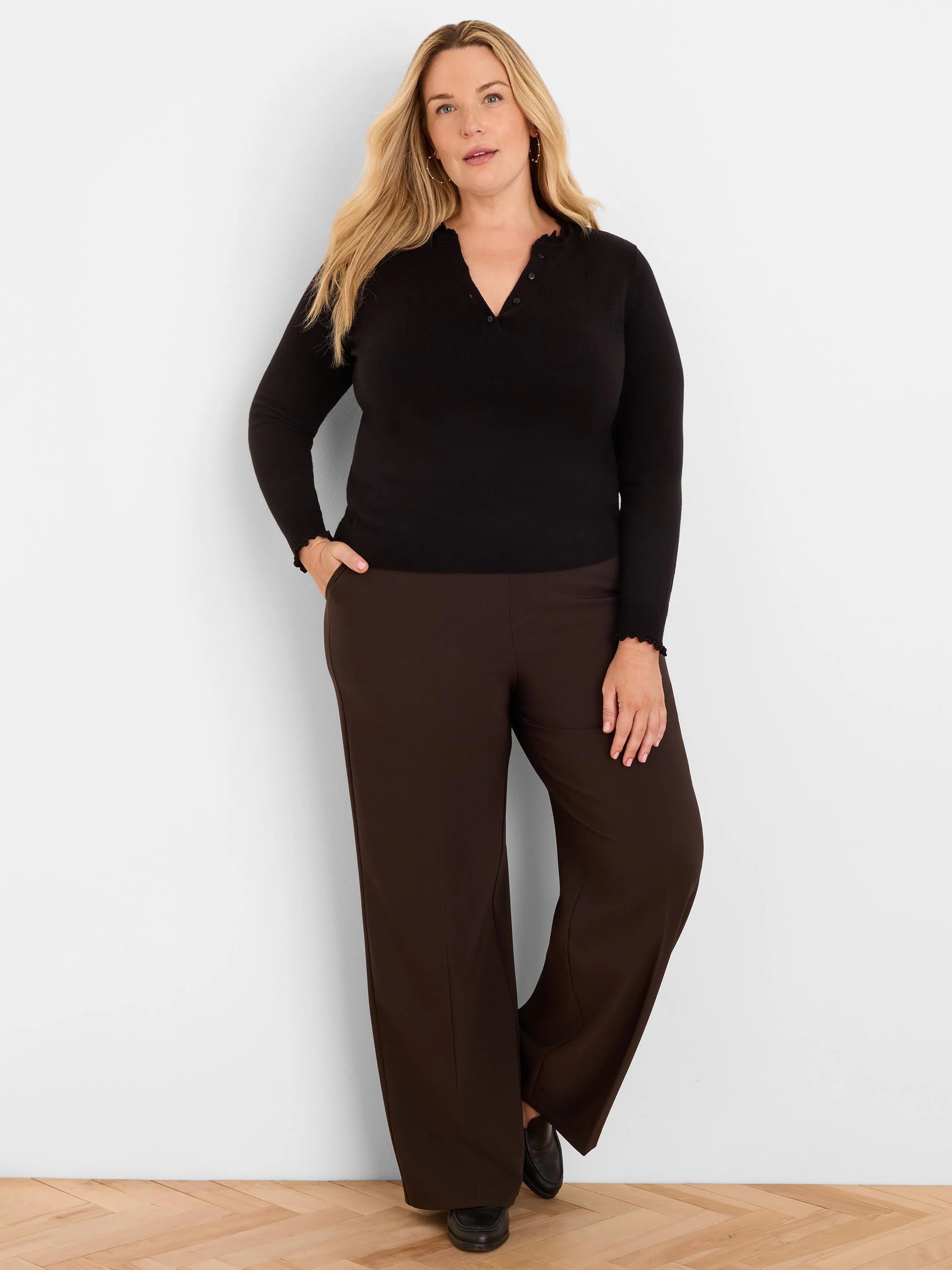 Dark brown, full-length wide-leg pants with a sleek, smooth finish.
