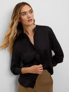 Black glossy long-sleeved shirt with a band collar and V-neck.