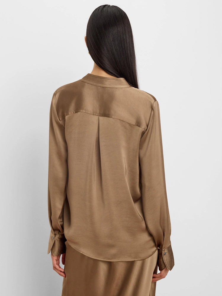 Back view of a glossy dark tan collared shirt with long sleeves, buttoned cuffs, and a pleated back yoke.