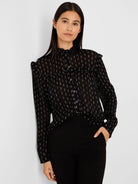 Black chiffon shirt with metallic dash pattern, ruffled high neck and buttoned front.