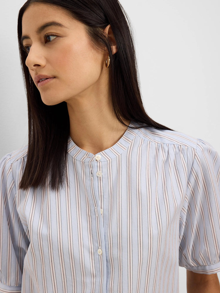 Light blue Eton Stripe Shirt with thin vertical pink and dark brown stripes, band collar, and short gathered sleeves.