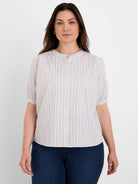 Light blue vertical stripe shirt with white & brown stripes, mandarin collar, button placket & short puffed sleeves.