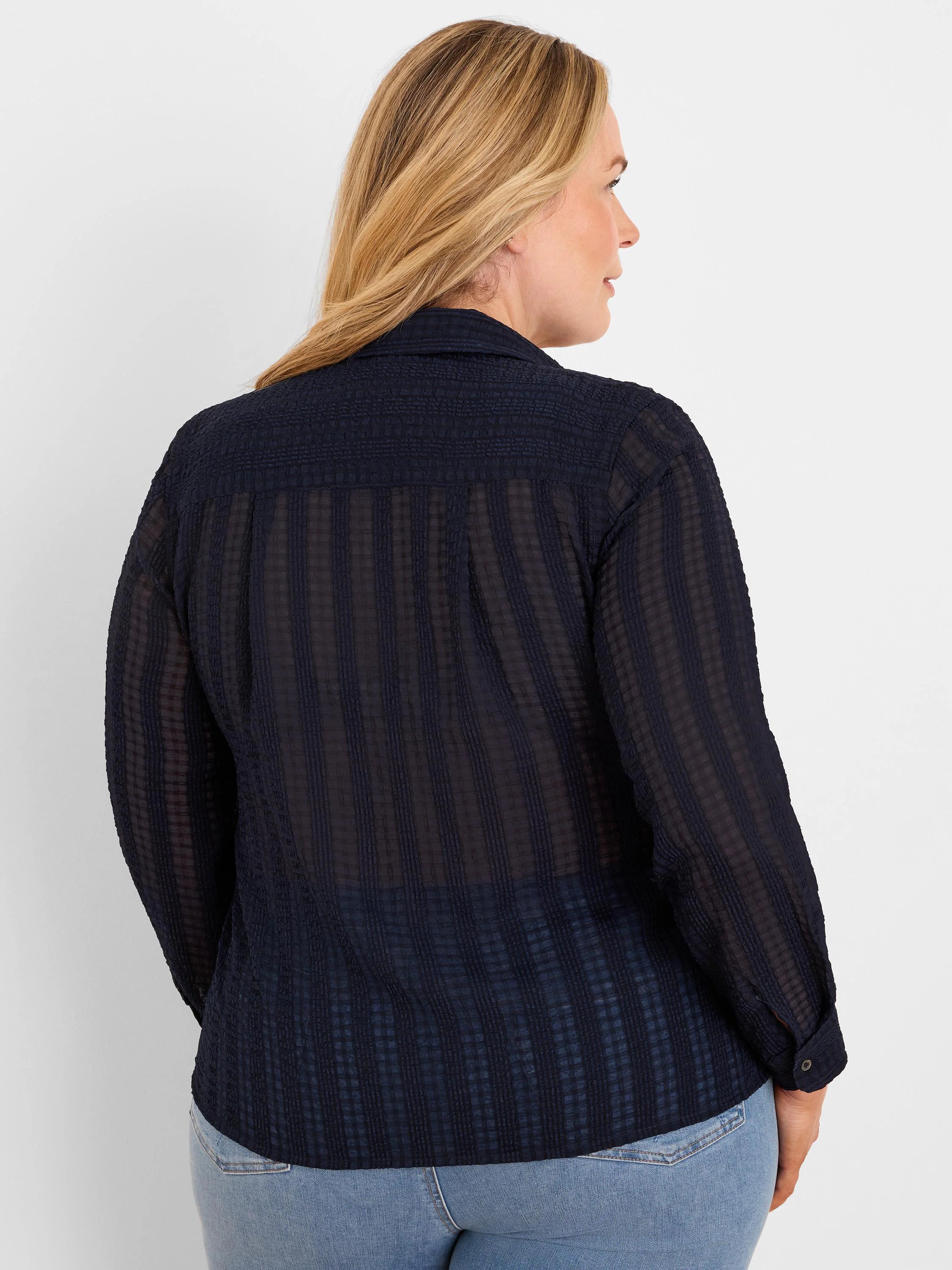 Dark blue chiffon jacquard shirt with subtle grid pattern and sheer vertical stripes, seen from behind.