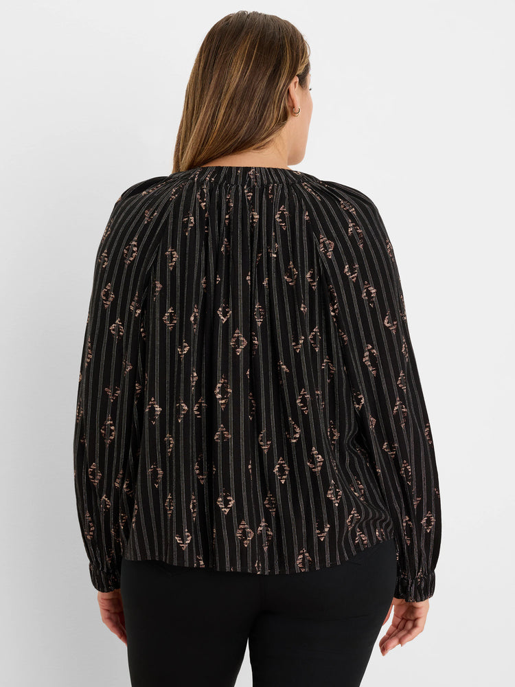 Black Diamond Lurex shirt, back view, with gathered neck, metallic vertical stripes, and small diamond patterns.