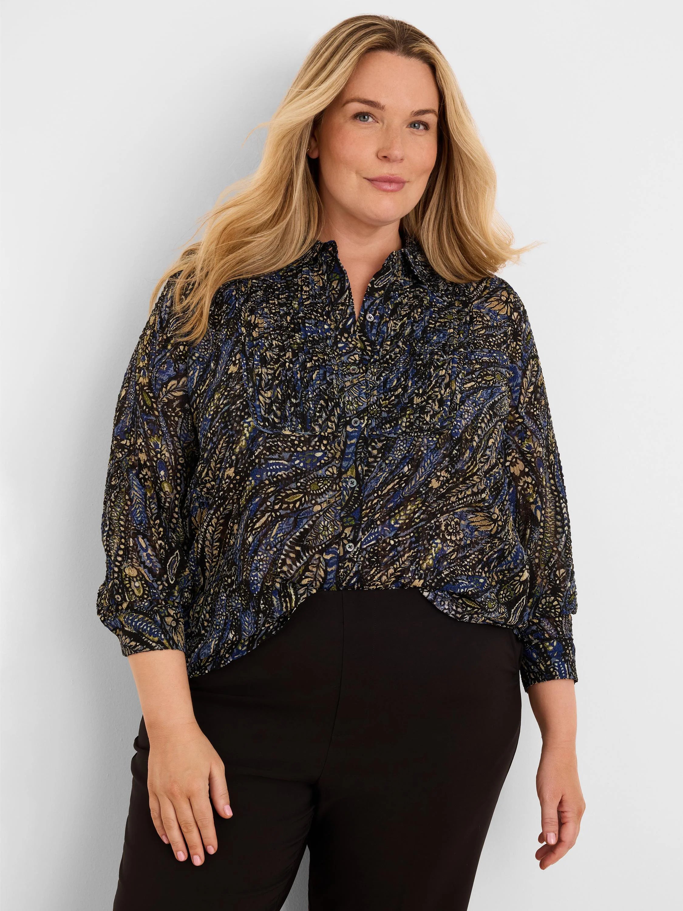 Dark crinkled chiffon shirt with blue and gold paisley pattern, button front, and 3/4 sleeves.