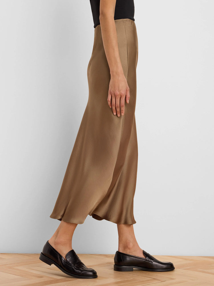 Long, flowing bronze-brown slip skirt with a shiny, satin finish.