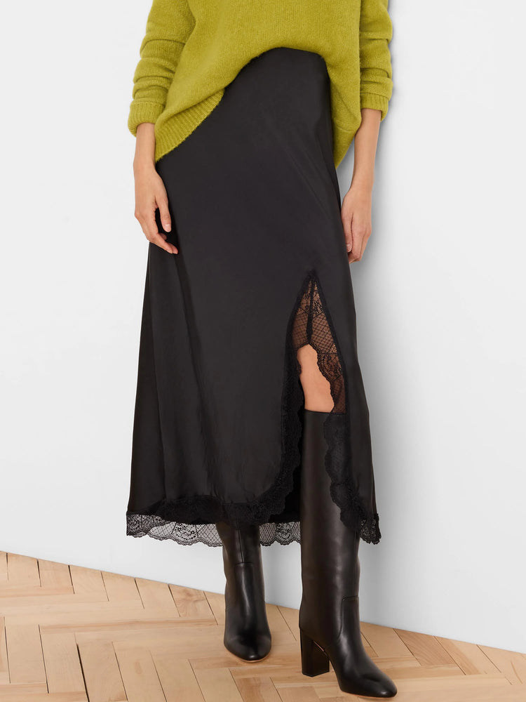 Black glossy midi slip skirt, with lace trim at the hem and a high side split.