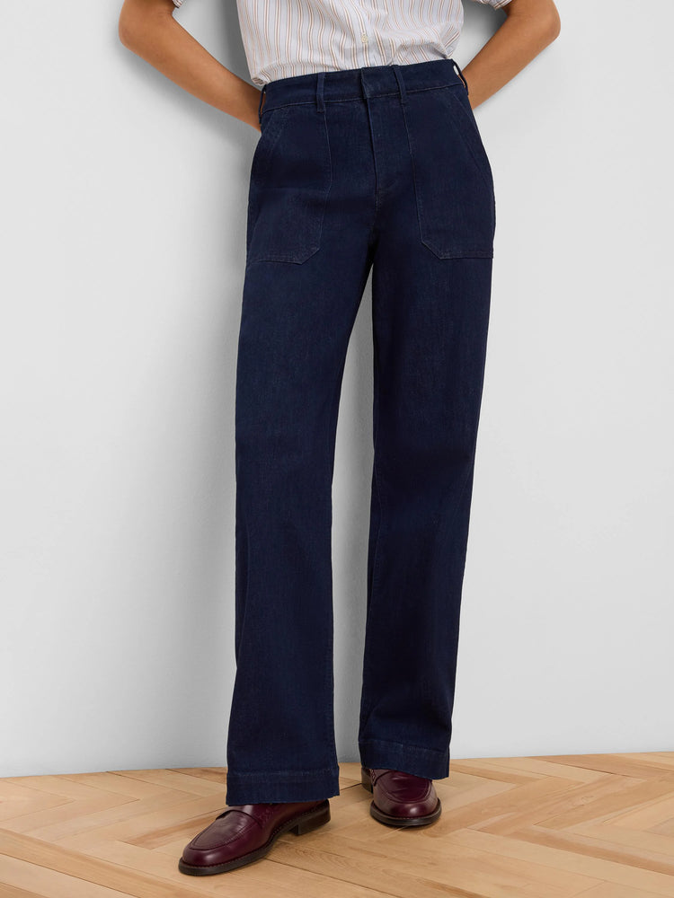 Dark blue, high-waisted, wide leg jeans with front patch pockets.