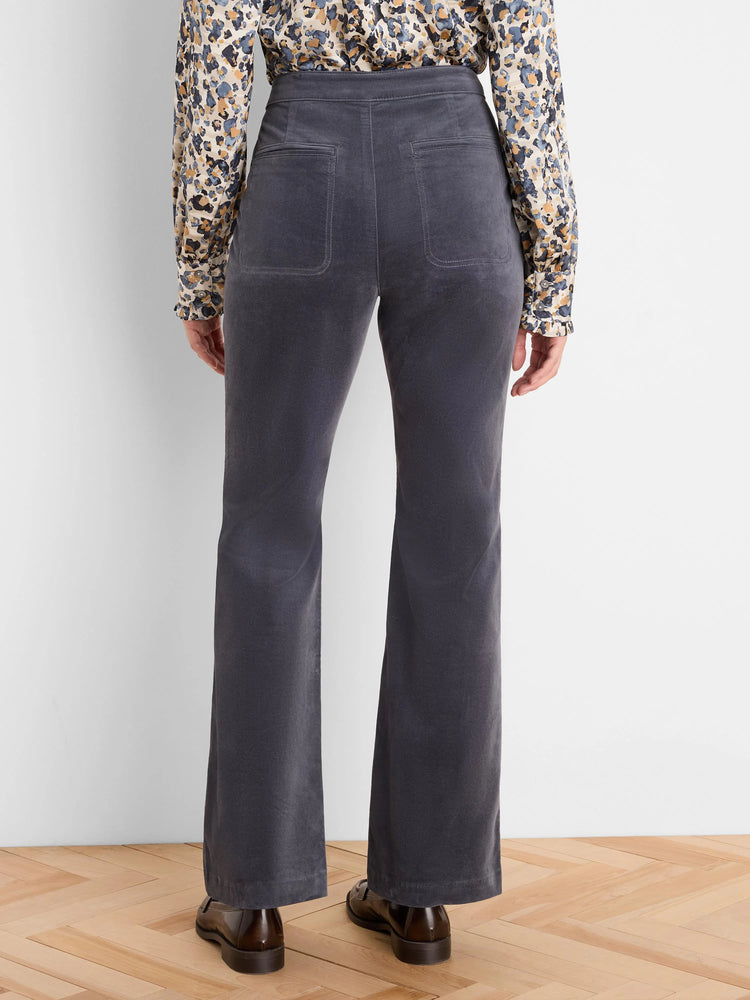 Charcoal grey velvet high-rise bootcut pants with two back patch pockets.