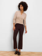 Dark brown Berkeley Boot Jeans with a boot-cut leg, ankle length, shown on a model.