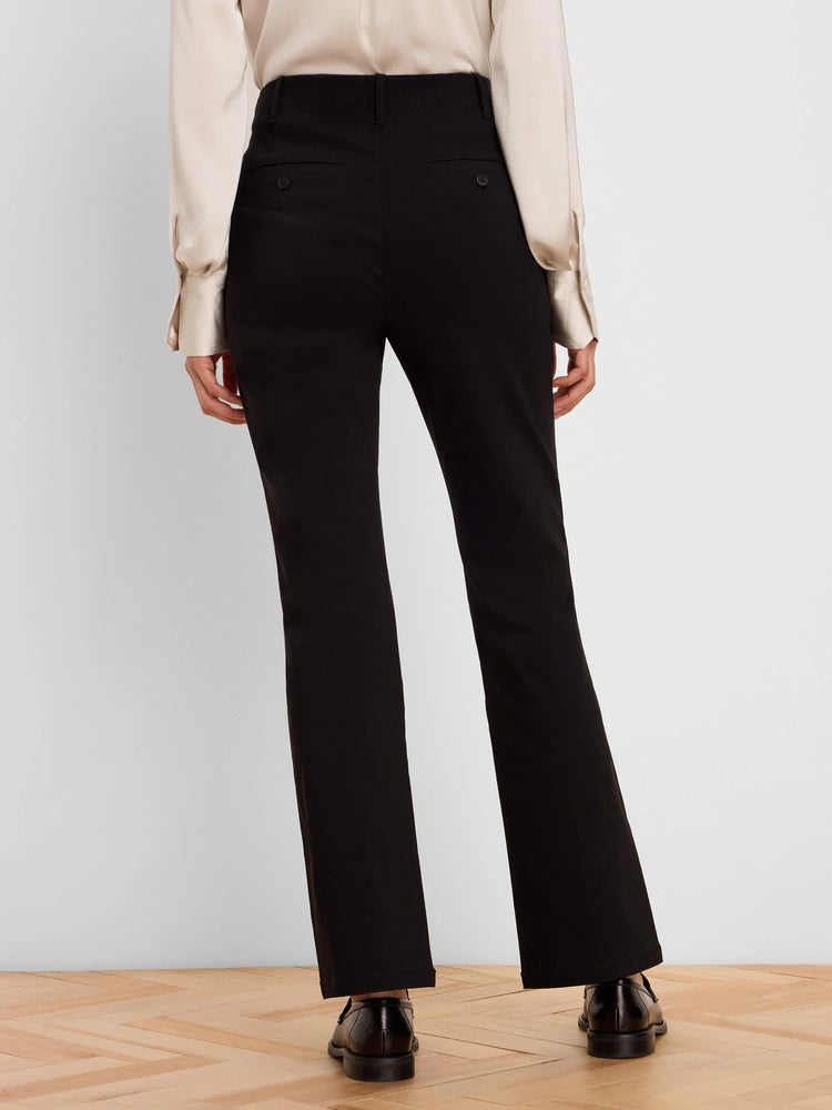 Black high-rise bootcut pants shown from the back, with small buttoned back pockets.