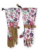 Pair of long gardening gloves.  White floral print with pink, red, & green flowers on back. Tan leather palms & cuffs. ...