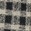 Coarse woven black & white small checkered fabric.